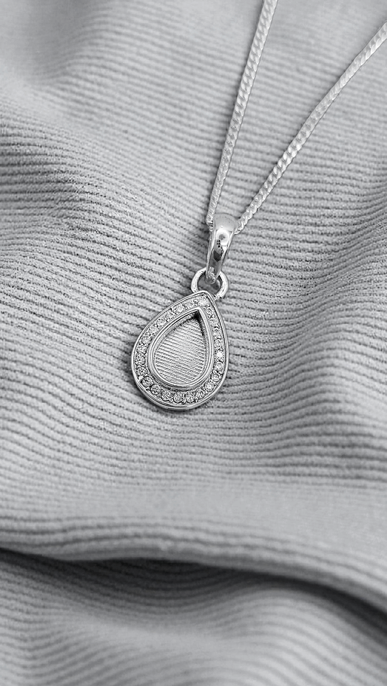 Droplet Cubic Zirconia Halo Keepsake Pendant