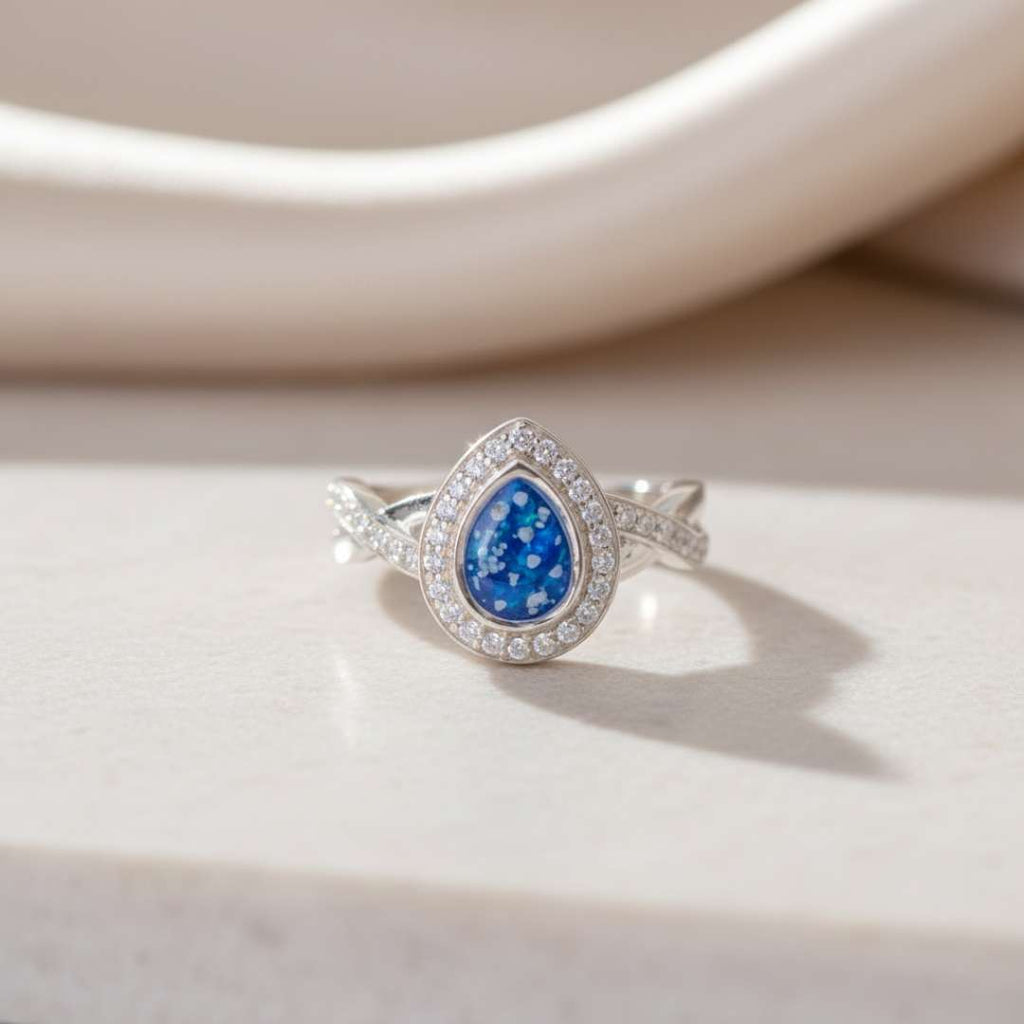 Cross Band Droplet Sparkle Cubic Zirconia Keepsake Ring