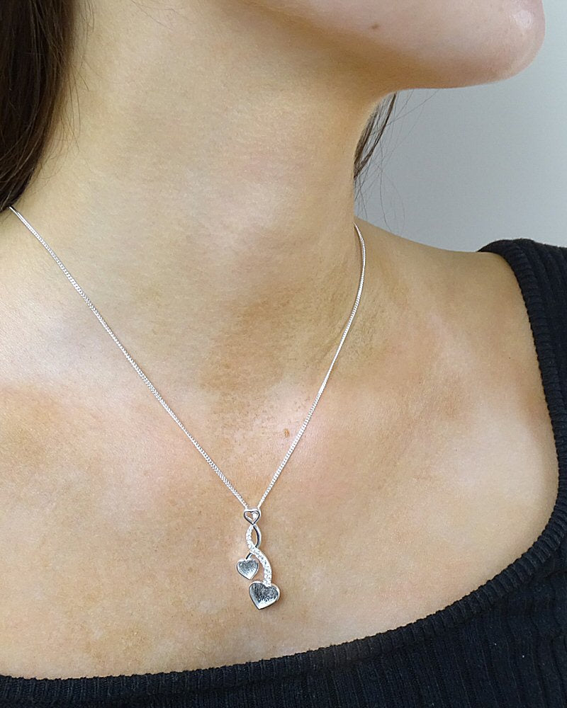 Two Hearts Entwined Cubic Zirconia Keepsake Pendant