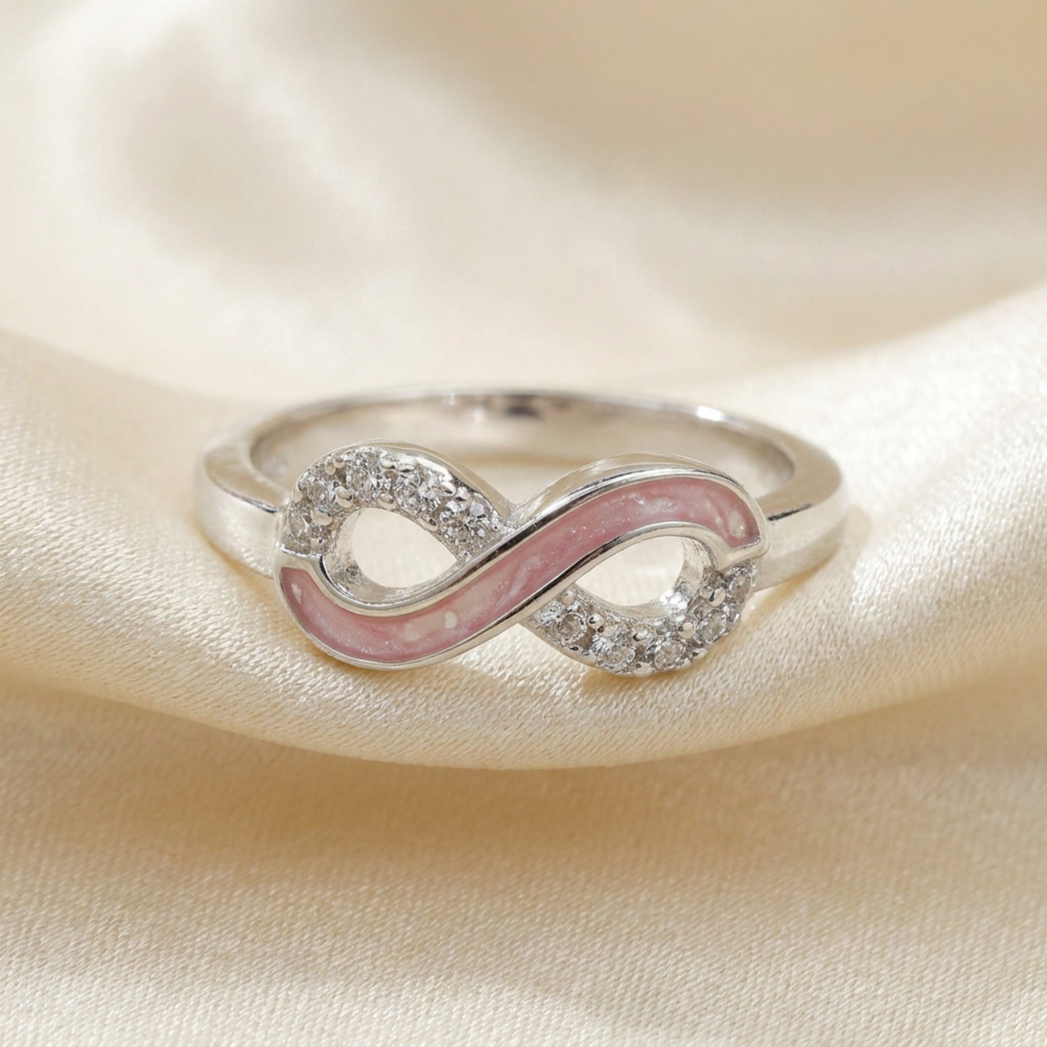 Infinity symbol keepsake cubic zirconia ring